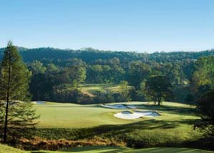 Views of hole 2 at Bright's Creek Golf Club in Mill Spring, North Carolina with views of the Blue Ridge Mountains