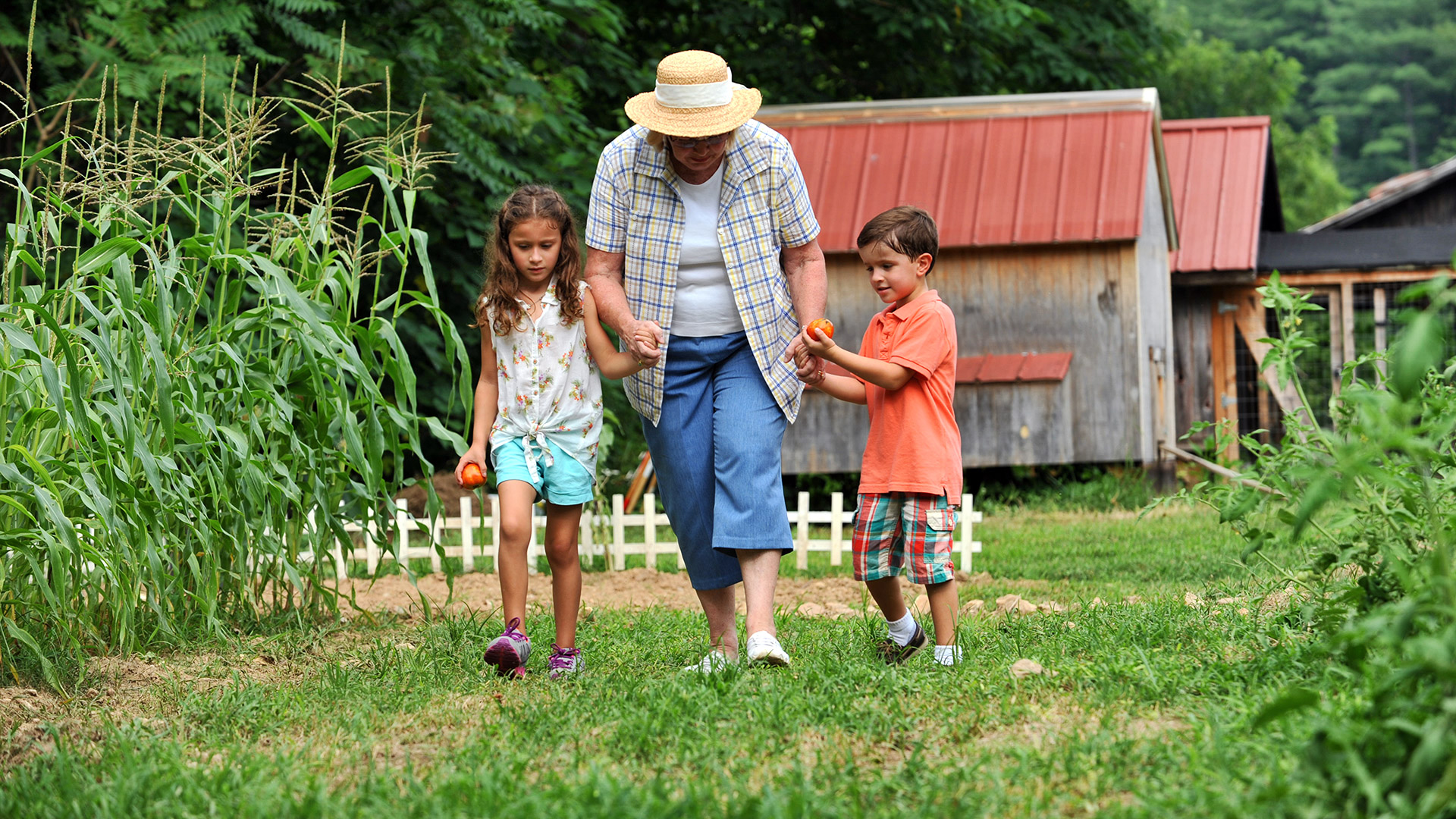 Families in the community garden at Bright's Creek Club
