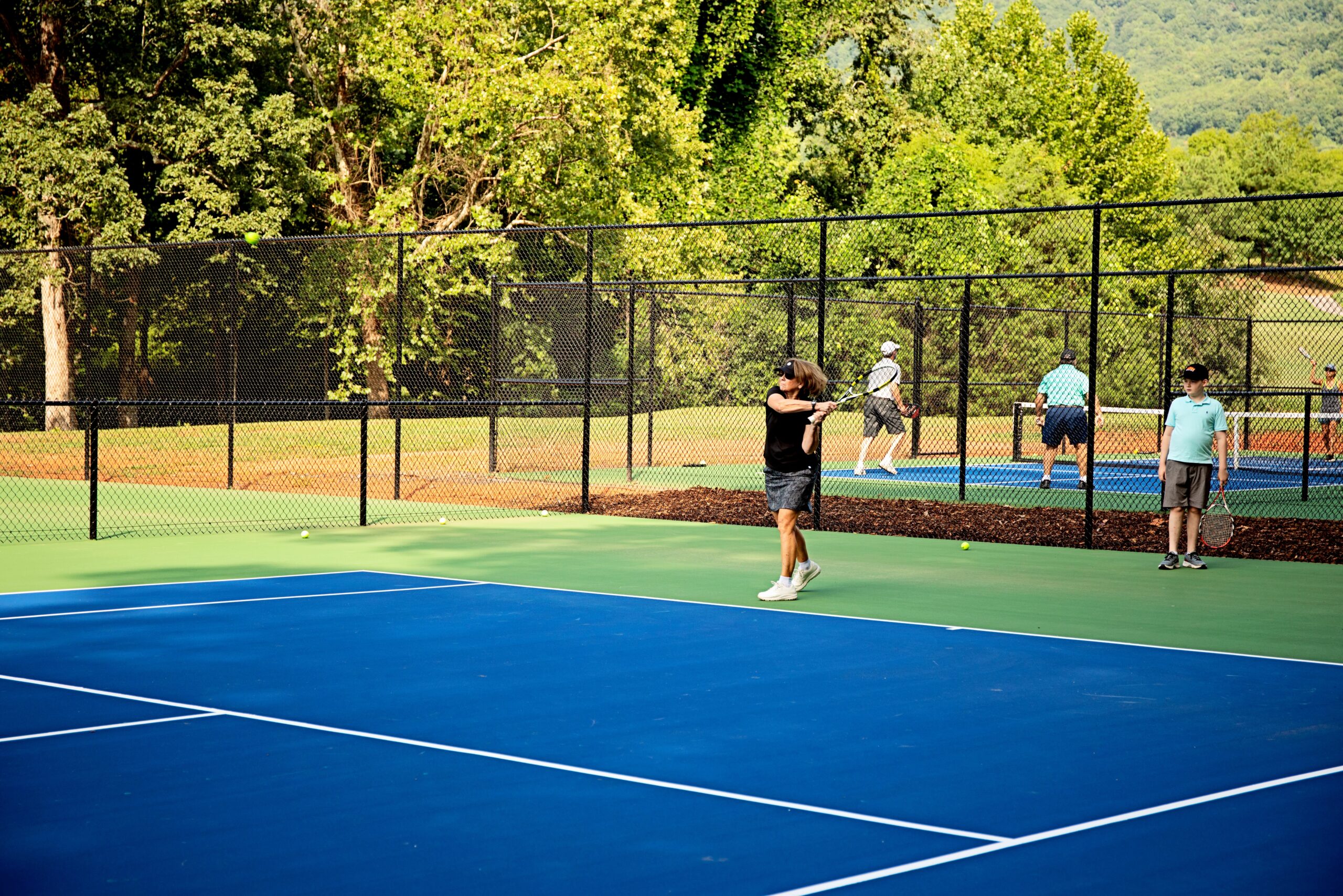 Tennis or pickleball with mountain views at Bright's Creek